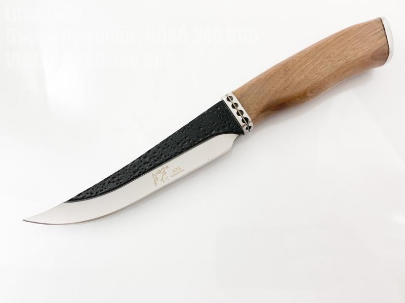 Красив добре балансиран ловен нож с фиксирано релефно острие