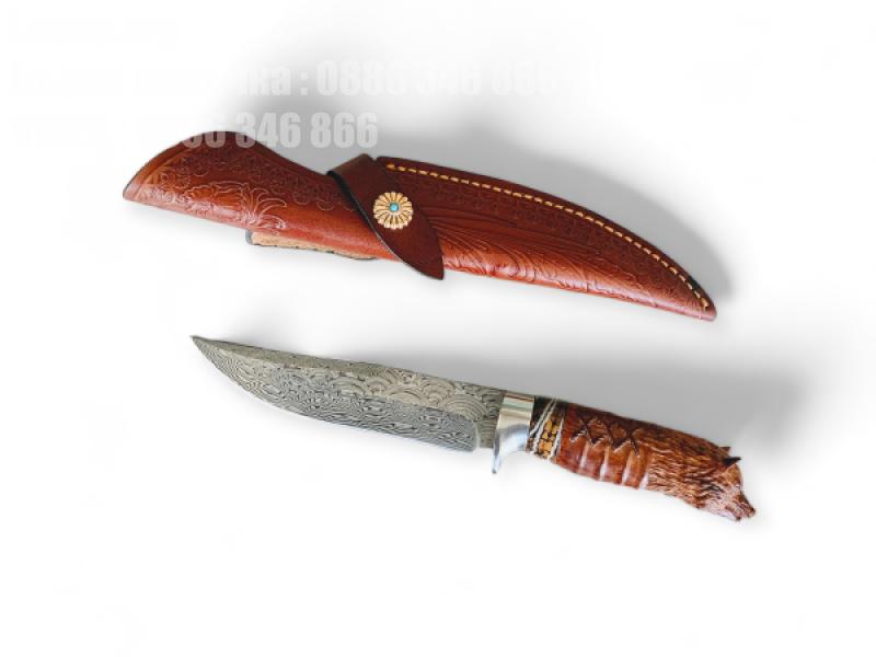 Ловен нож с ръкохватка във формата на глава на вълк и кания