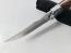 Руски ловен нож с извито острие подходящ за дране  Волк стал 65х13 с метална глава на Вълк