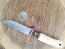 Малко ловно ножче с дървена дръжка и калъф за носене на колана